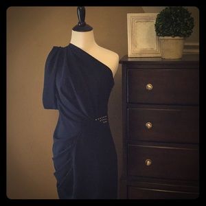 Navy blue one-shoulder cocktail dress.